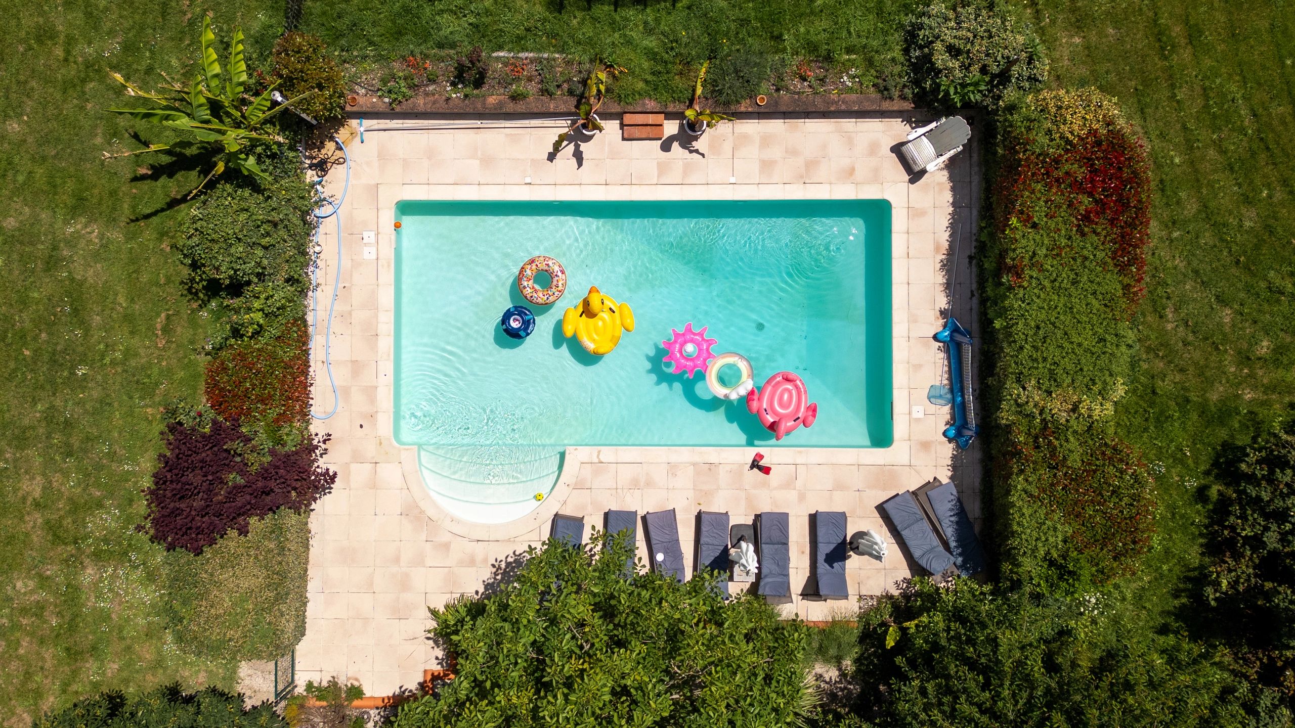 Completed pool project with coordinated site work